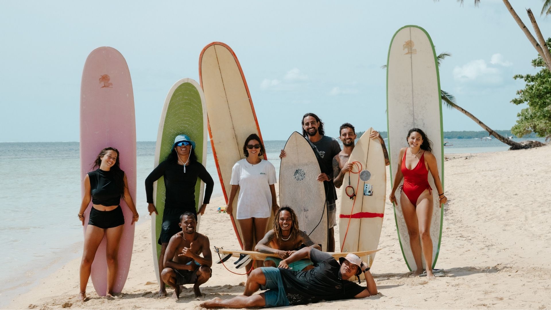 Surf retreat group on the beach